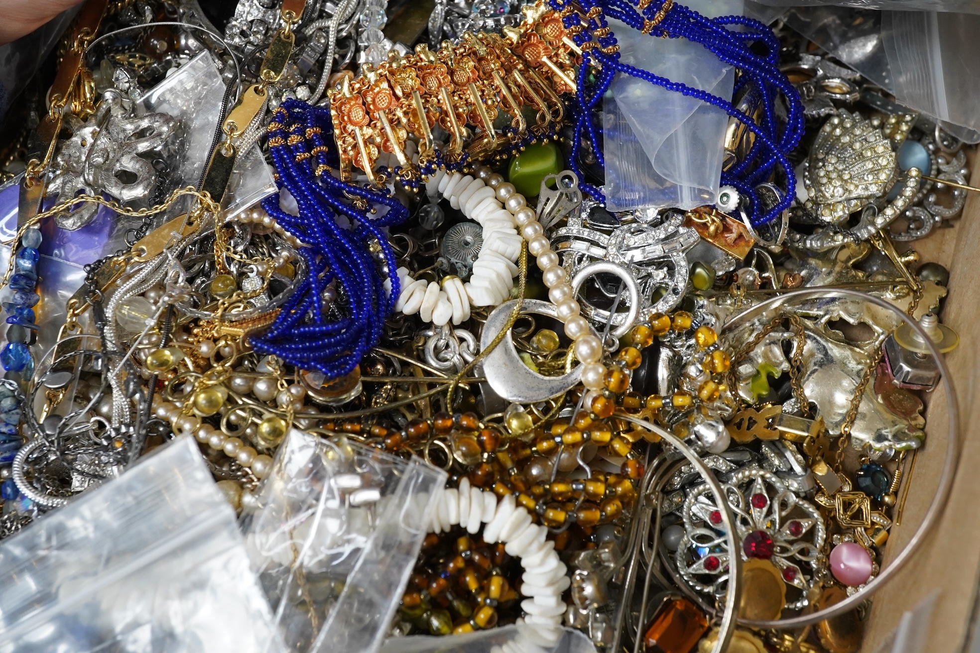 A large quantity of assorted costume jewellery, etc. including six small cut steel buttons.